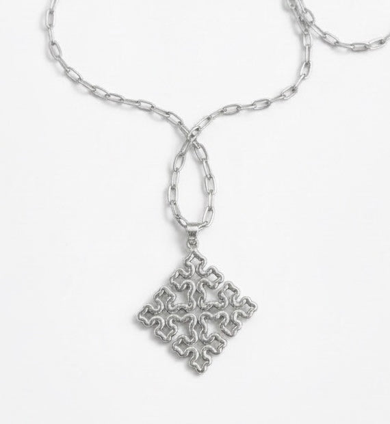 Silver-tone Bela 2.0 necklace with an ornate Ethiopian cross pendant and oval-link chain