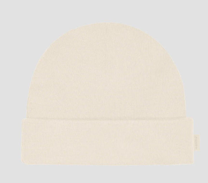 Light cream Hairbrella kids cuffed beanie with a folded brim and small side label.