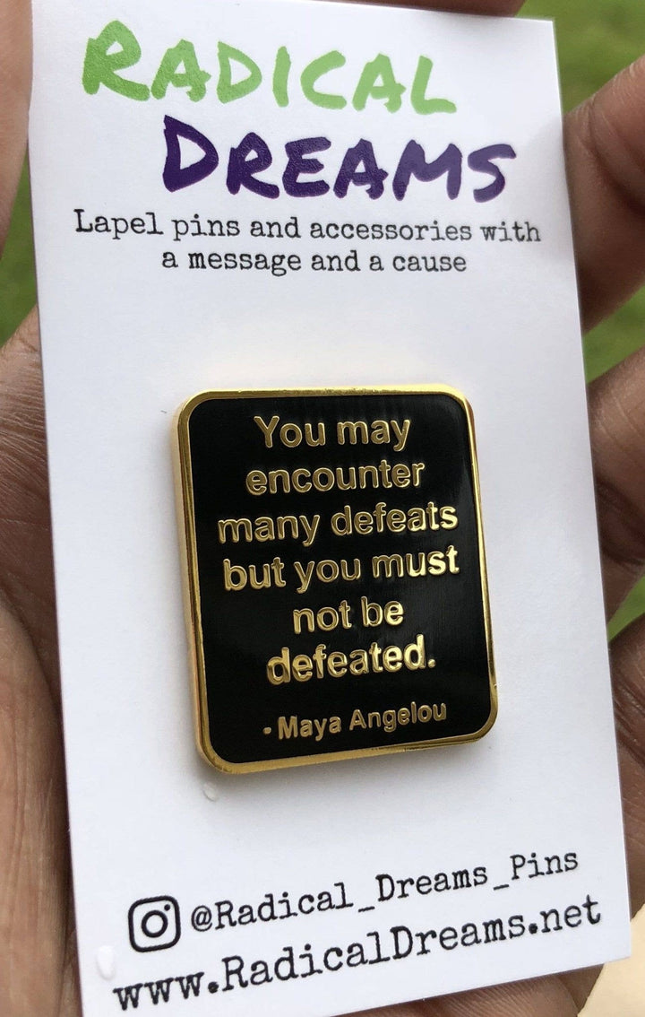 Never Defeated Lapel Pin - The Village Retail