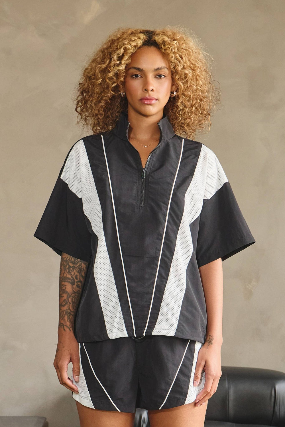 Nylon & mesh contrast half zip - up short slv top - The Village Retail